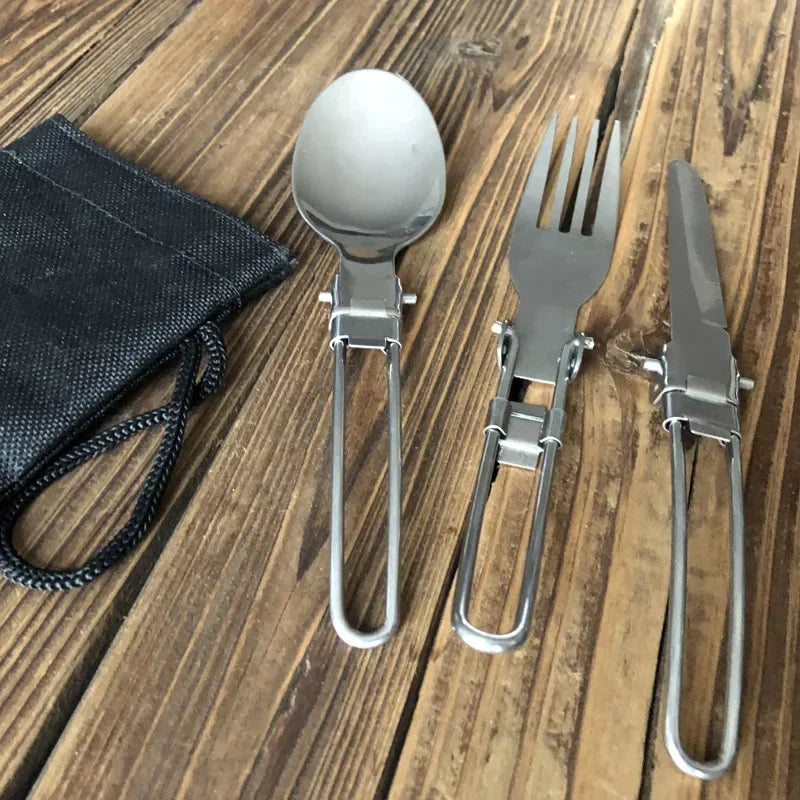 Foldable stainless steel camping fork, knife, and spoon set arranged for display (view 4)