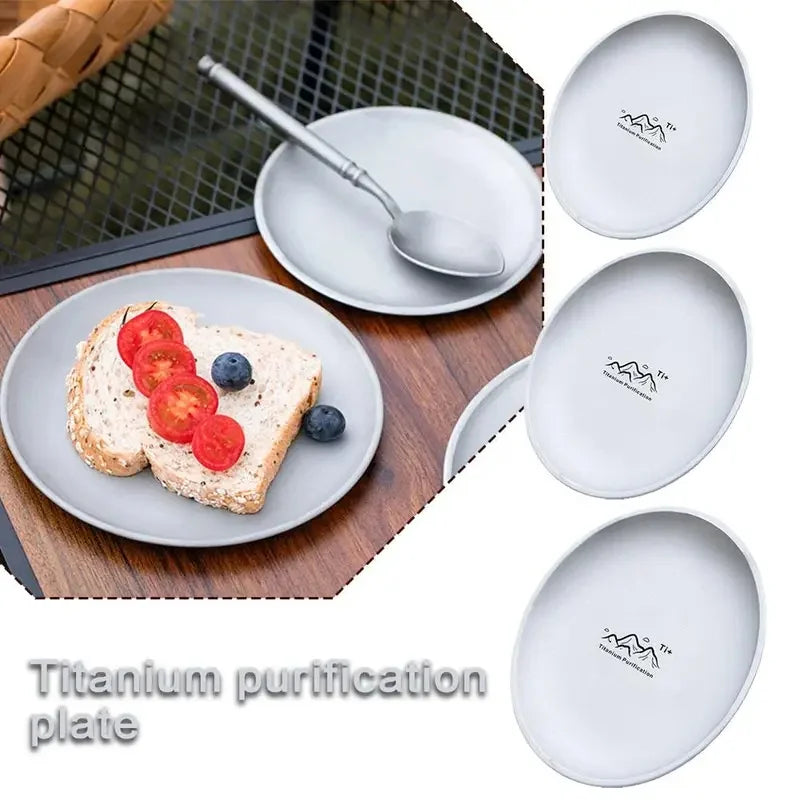 Single round titanium camping plate on a neutral background (view 2)