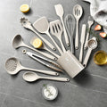 A 15-piece silicone kitchen utensil set in khaki, including spatulas, spoons, and a whisk, arranged on a light background.