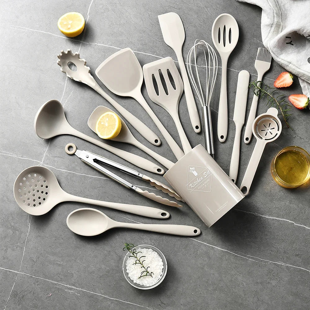 A 15-piece silicone kitchen utensil set in khaki, including spatulas, spoons, and a whisk, arranged (view 7)