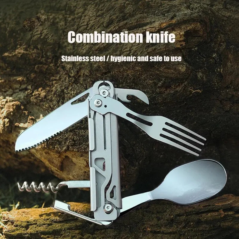 White stainless steel folding cutlery set, including a knife, fork, and spoon, shown in a compact fo (view 2)