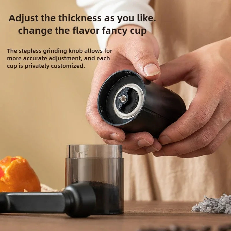 Black portable plastic hand crank coffee grinder with adjustable bearing for travel and home use (view 2)