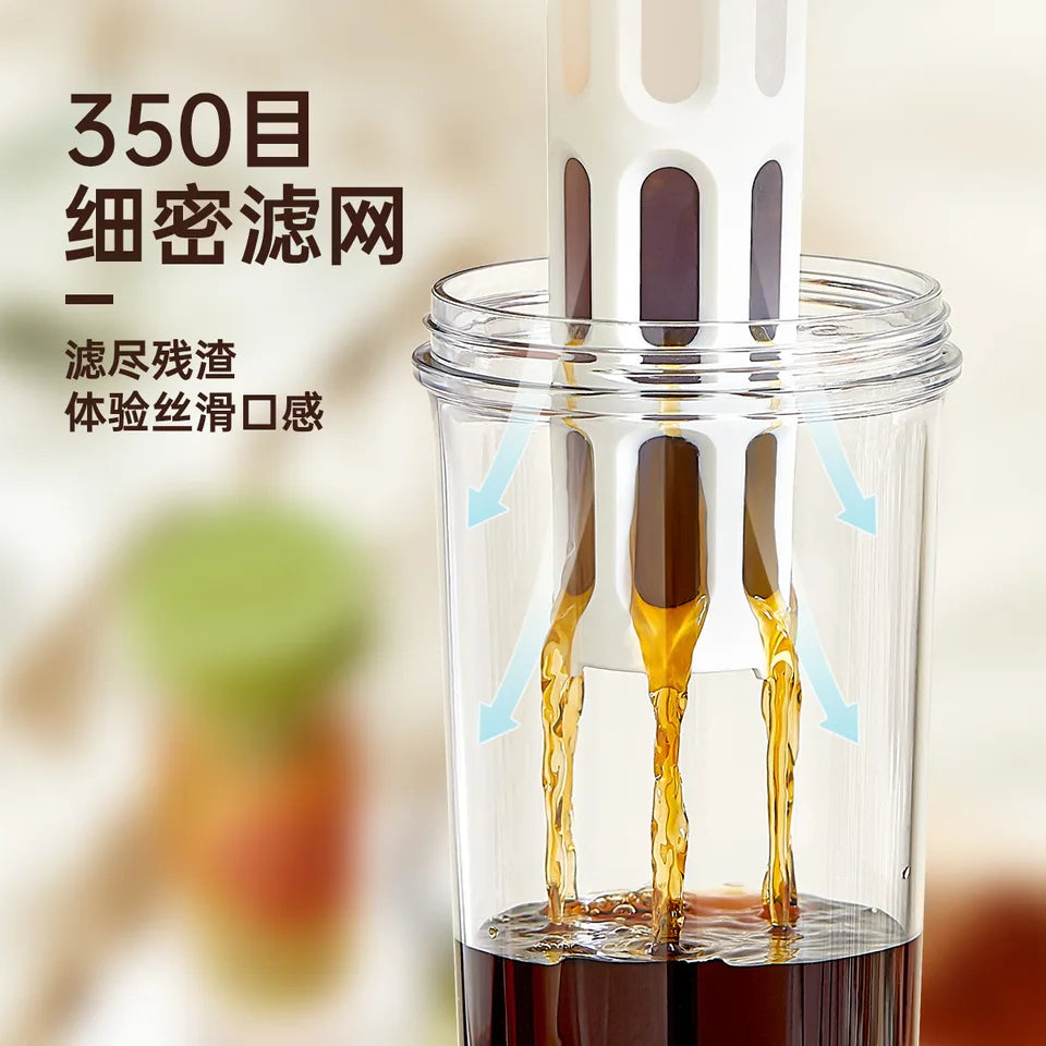 PP cold brew coffee maker with a handle, shown in an outdoor setting (view 4)