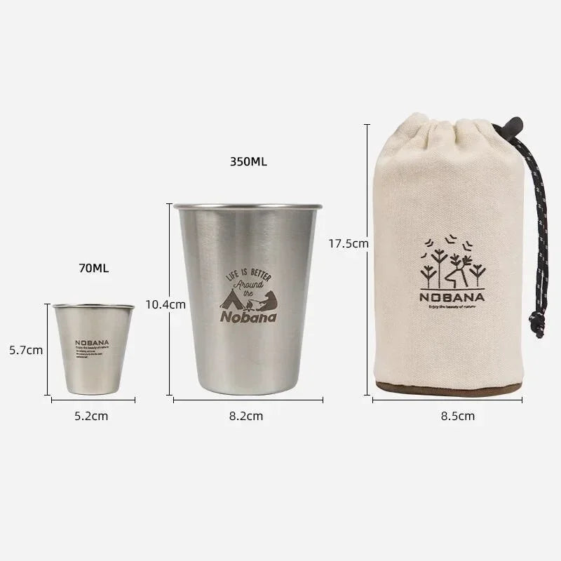 A stack of 304 stainless steel camp cups in an outdoor setting (view 5)