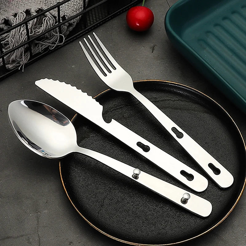 A 3-piece stainless steel folding utensil set, including a fork, spoon, and knife, displayed in thei (view 2)