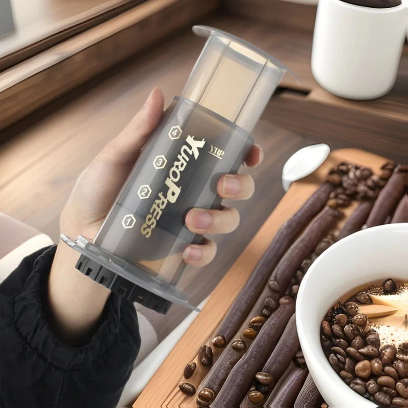 Portable press-style coffee maker in black, white, and red color options (view 3)