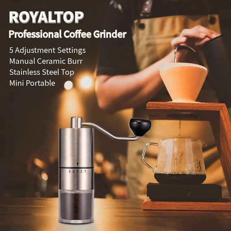 Portable hand-crank coffee grinder made of stainless steel with a black handle (view 4)
