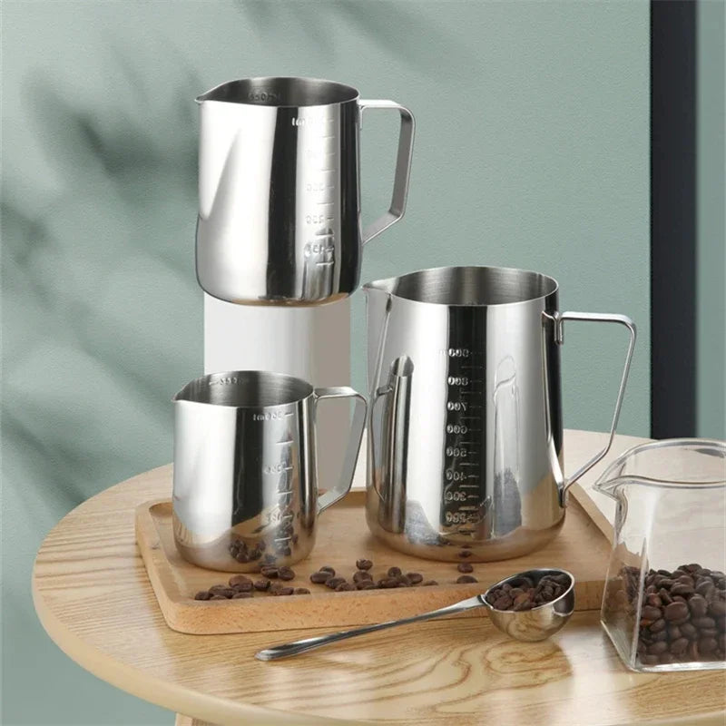 Stainless steel milk frothing pitcher with pointed spout and measurement scale (view 3)