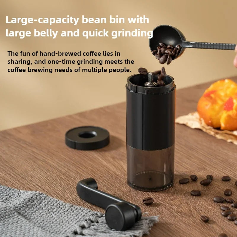 Black portable plastic hand crank coffee grinder with adjustable bearing for travel and home use (view 3)