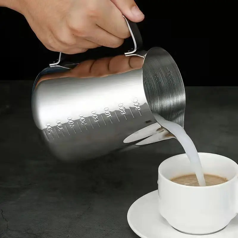Stainless steel milk frothing pitcher with pointed spout and measurement scale (view 7)
