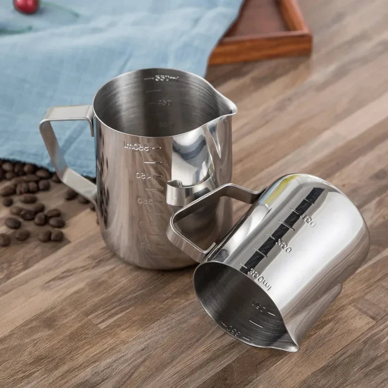 Stainless steel milk frothing pitcher with pointed spout and measurement scale (view 6)