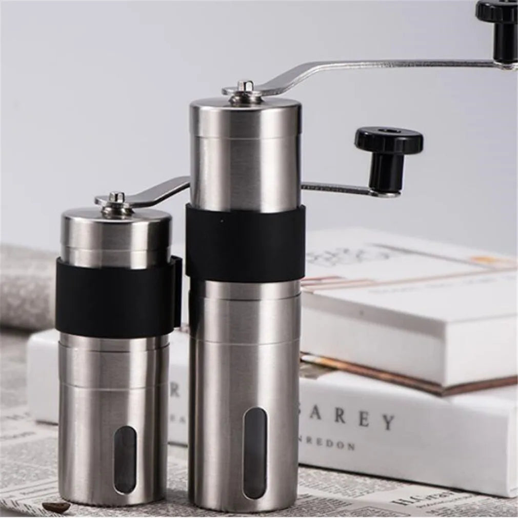 Portable stainless steel manual coffee grinder with handle and clear base (view 7)