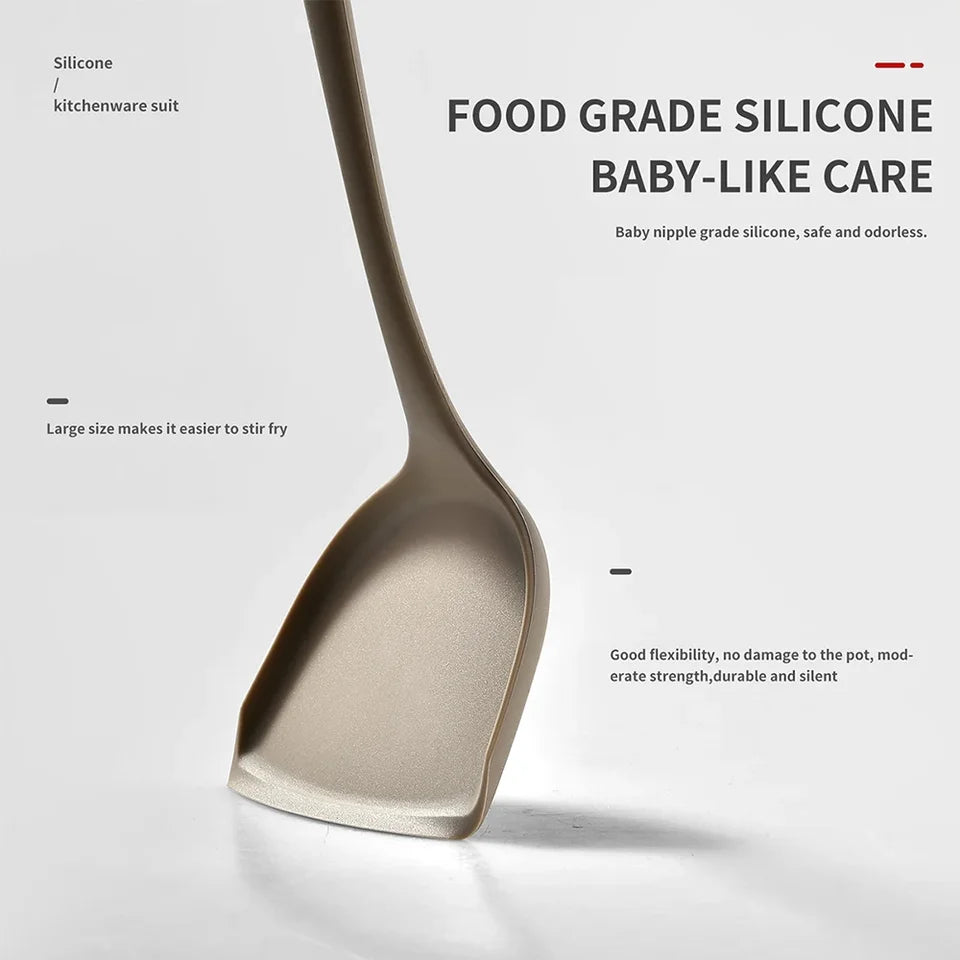 A 15-piece silicone kitchen utensil set in khaki, including spatulas, spoons, and a whisk, arranged (view 6)