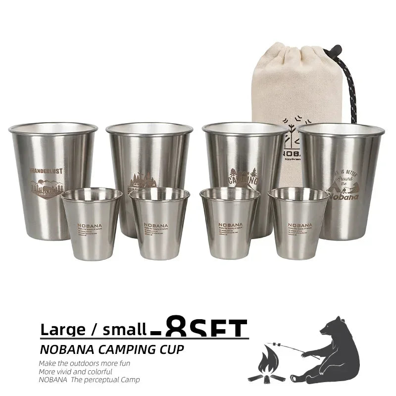 A stack of 304 stainless steel camp cups in an outdoor setting (view 6)
