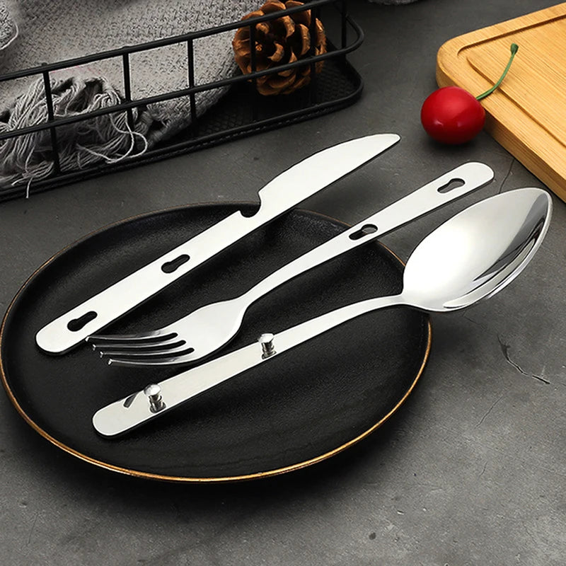 A 3-piece stainless steel folding utensil set, including a fork, spoon, and knife, displayed in thei (view 3)